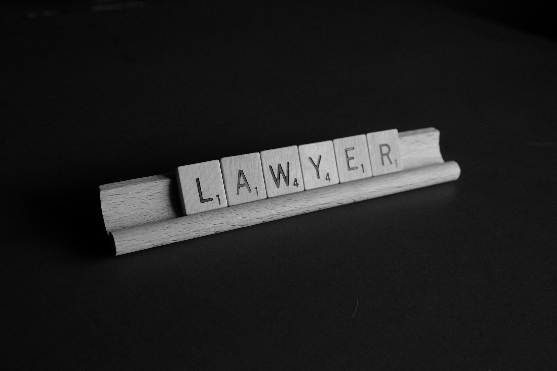 civil rights cases colorado - the word lawyer spelled out in Scrabble tiles
